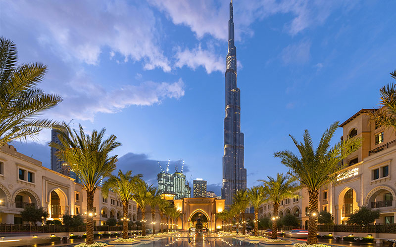 Burj Khalifa in Dubai in background of water feature