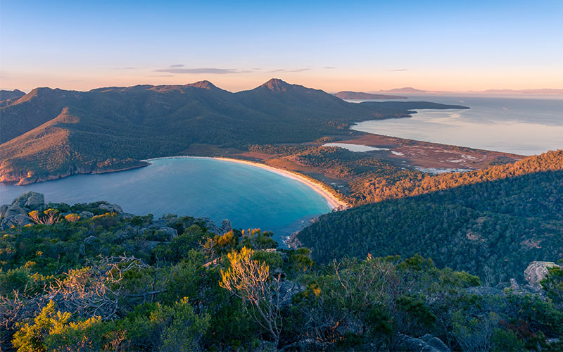 Shores of Wineglass Bay and mountains in Freycinet National Park, Tasmania