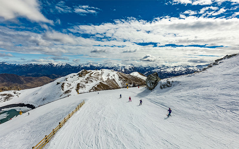 Mountain vistas and ski slopes abound in Queenstown, New Zealand