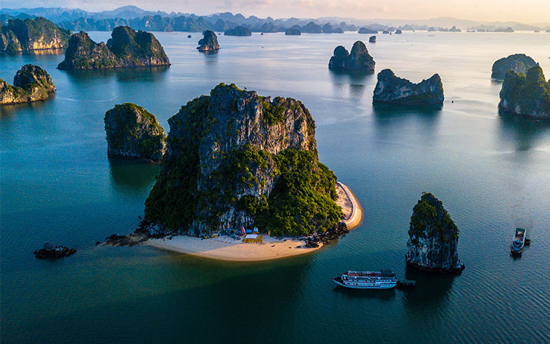 Cruise ships passing through Ha Long Bay