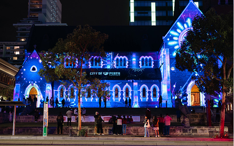 Rio Tinto lights show on a historic building in the Perth CBD